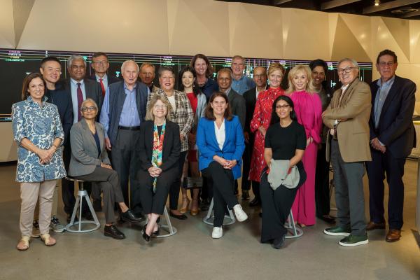 In the center, President Kornbluth poses with the School of Engineering Dean's Advisory Council members.